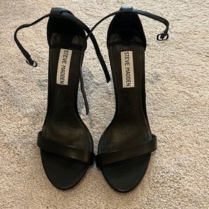 Gently used Steve Madden black leather heels.